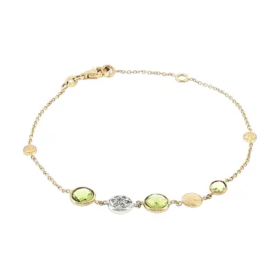 Armband aus 14 Karat Gold mit Peridoten und Zirkonia