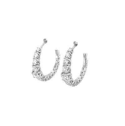 Runde Goldohrringe mit Diamanten