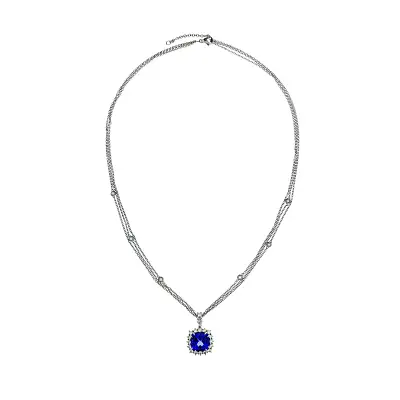 Halskette mit Tansanit im Halo-Design, umgeben von Diamanten