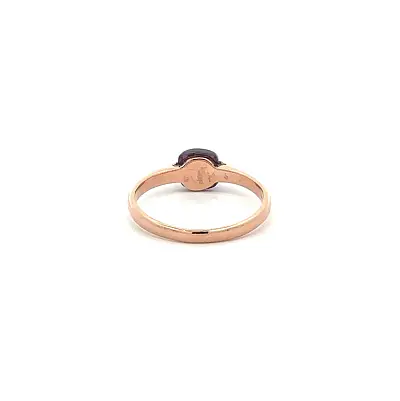 Goldring mit violettem Stein