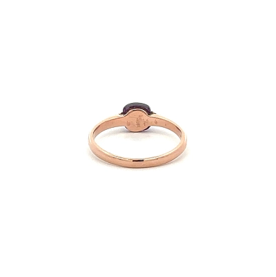 Goldring mit violettem Stein