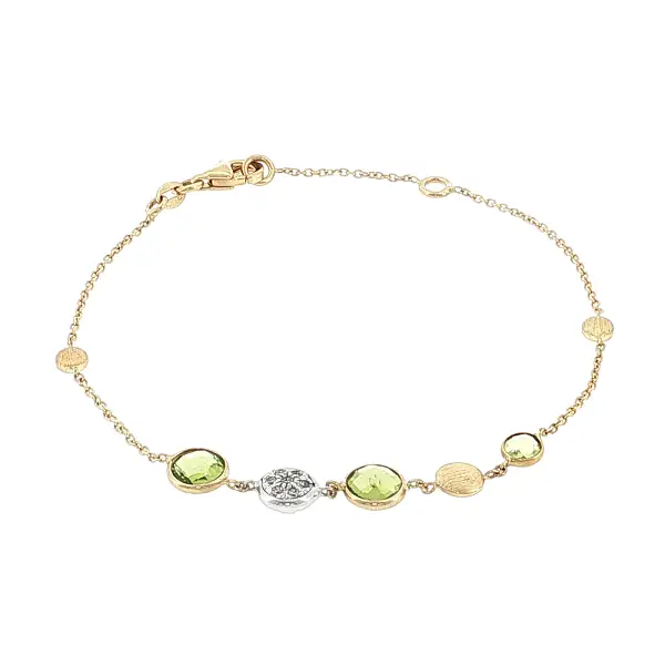 Armband aus 14 Karat Gold mit Peridoten und Zirkonia