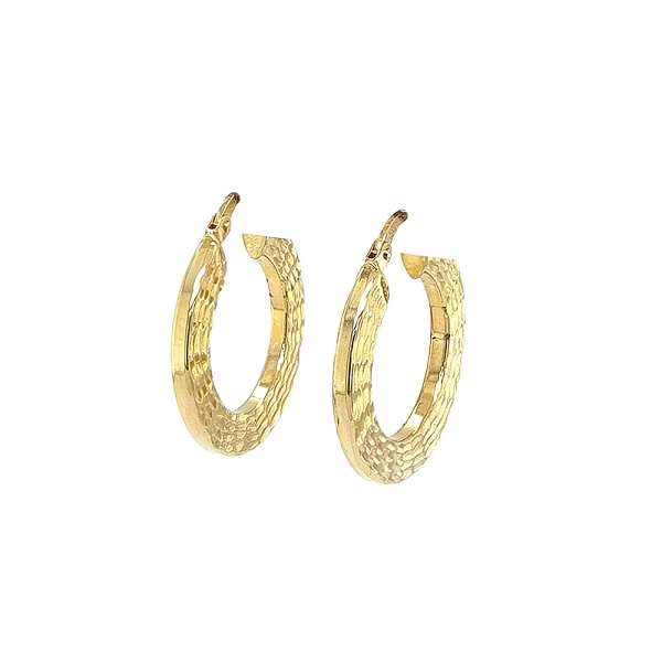 Elegante goldene Creolen