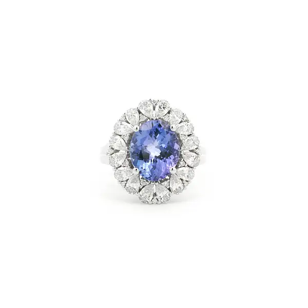 Weißgoldring mit Tansanit und Diamantkranz