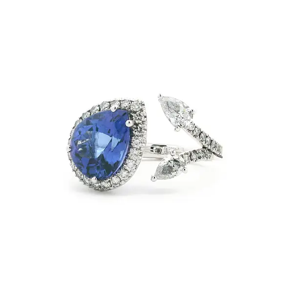 Weißgoldring mit tropfenförmigem Tansanit und Diamanten
