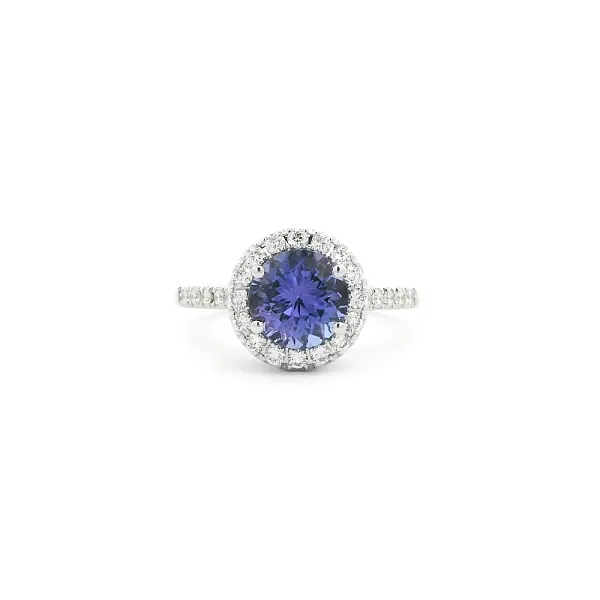 Weißgoldring mit Tansanit und Diamantkranz