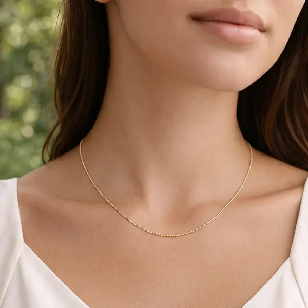 Goldkette im Panzer-Muster