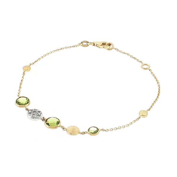 Armband aus 14 Karat Gold mit Peridoten und Zirkonia