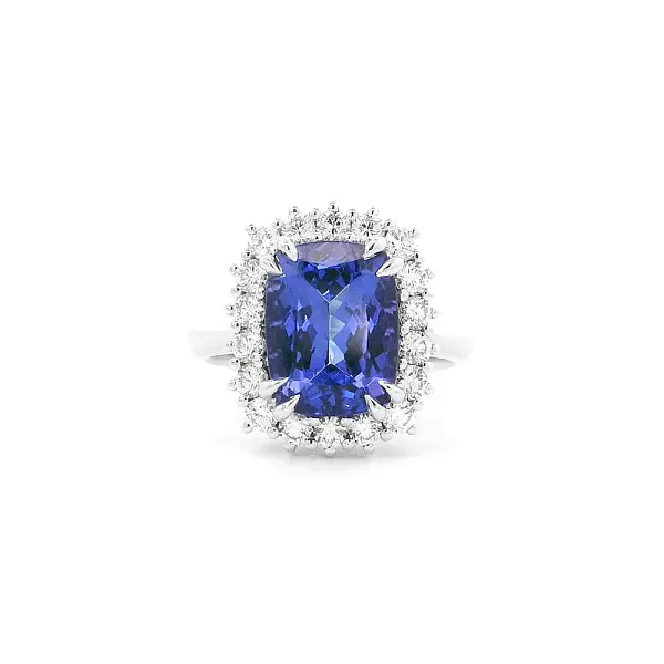 Luxusring mit Tansanit, umgeben von Diamanten in Weißgold