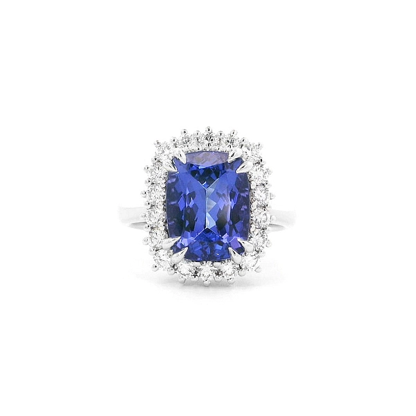 Luxusring mit Tansanit, umgeben von Diamanten in Weißgold