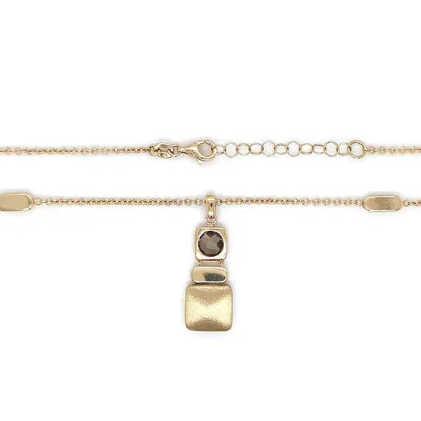 Goldene Halskette mit braunem Stein