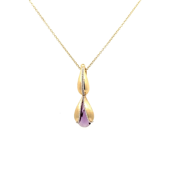 Goldene Halskette mit lila Stein