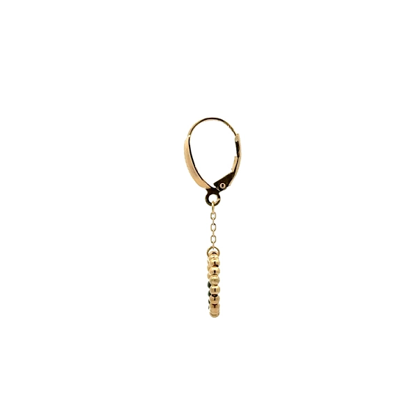 Goldene Ohrringe mit schwarzen Steinen