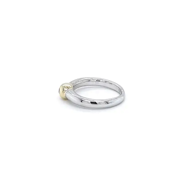 Ring mit Zirkon aus Kombinationsgold
