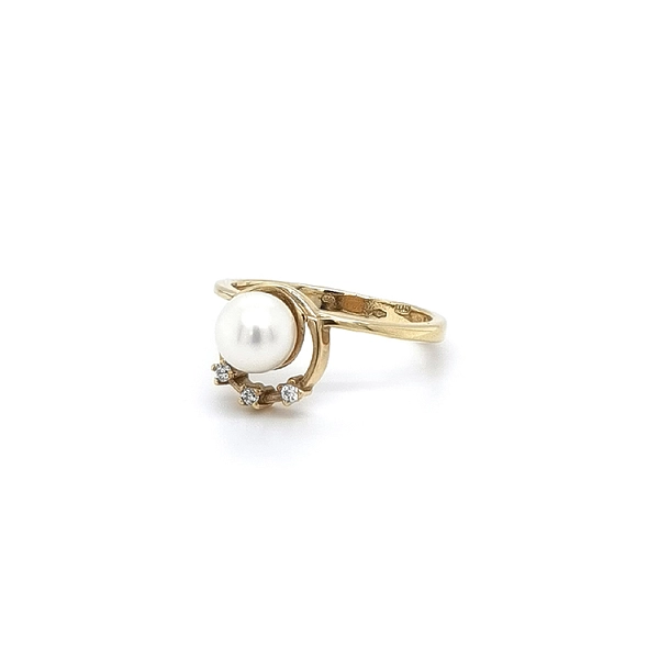Goldring mit Perle und Zirkonen