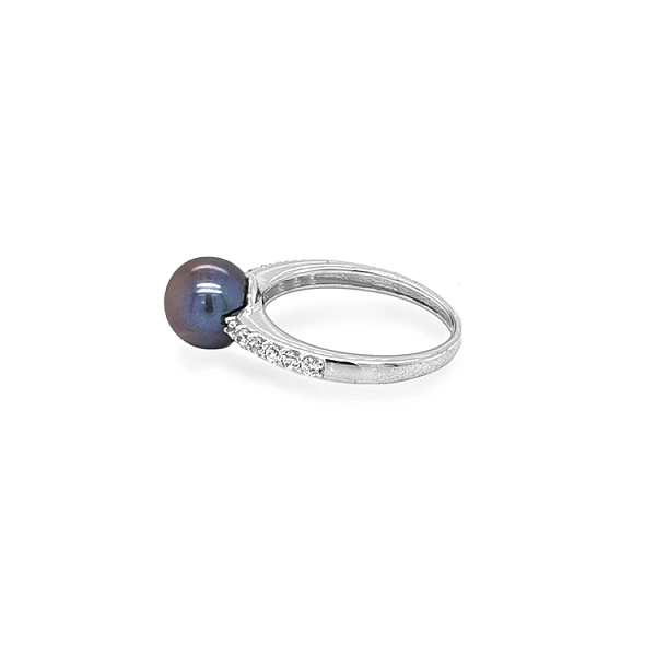 Goldring mit schwarzer Perle und Zirkonen