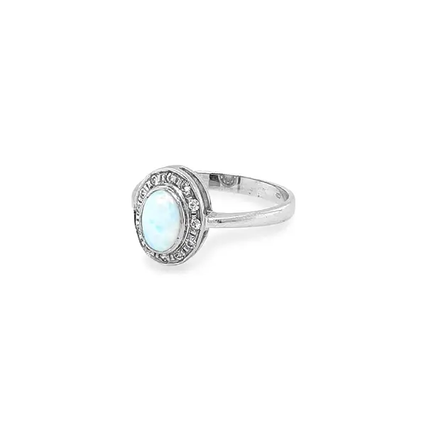 Goldring mit Opal und Zirkonen