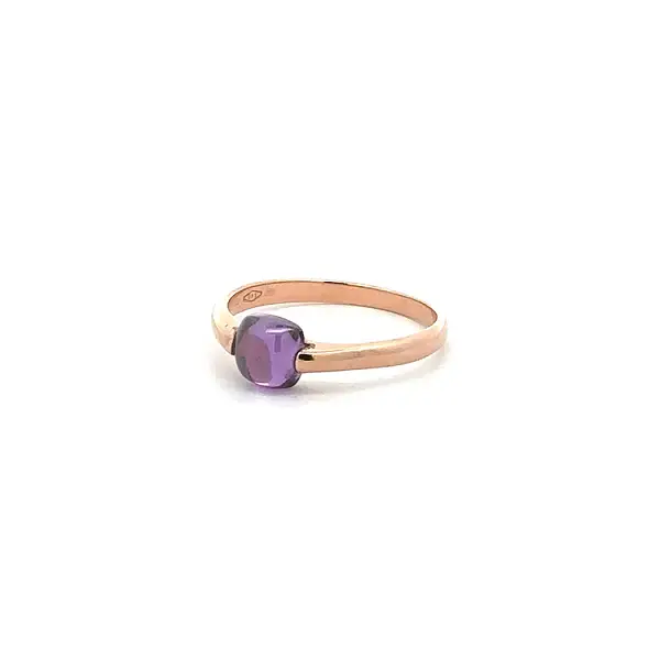 Goldring mit violettem Stein