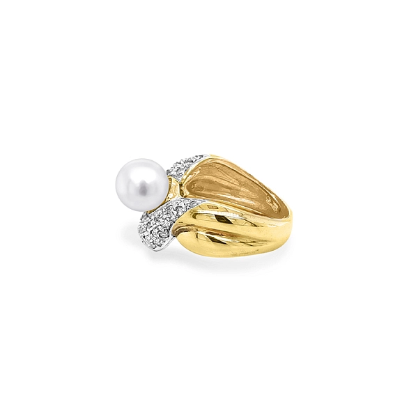 Goldring mit Perle und Zirkonen