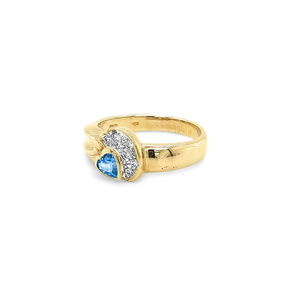 Exklusiver Goldring mit herzförmigem Blau-Topas und Zirkonia