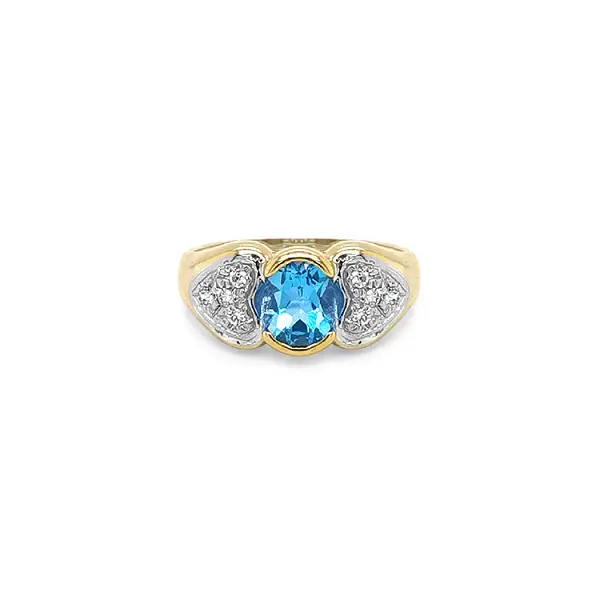 Exklusiver Goldring mit blauem Topas und Zirkonia
