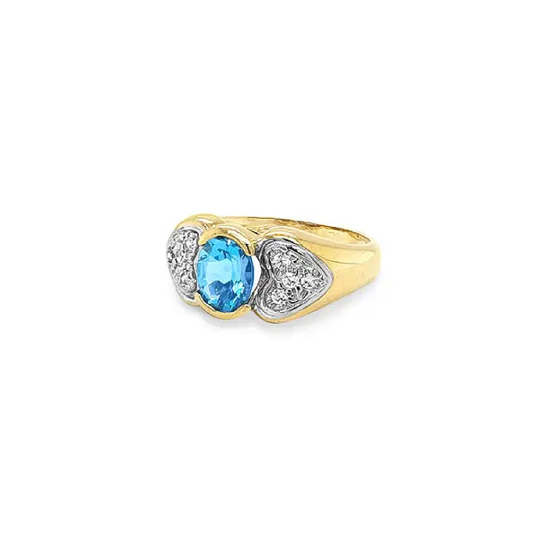 Exklusiver Goldring mit blauem Topas und Zirkonia