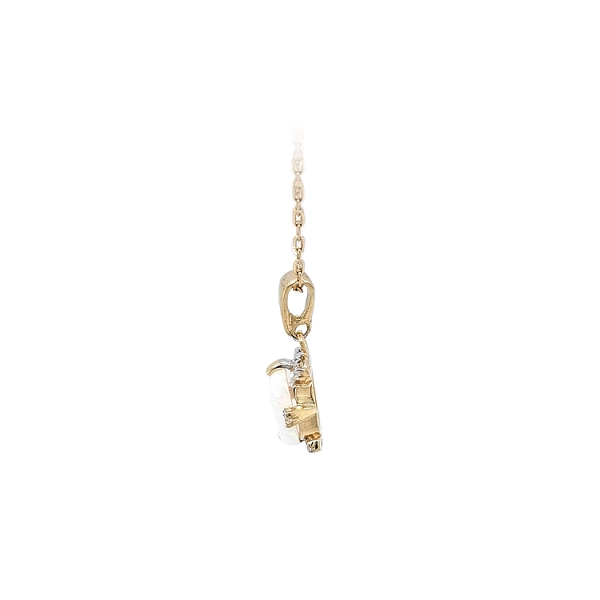 Gold-Anhänger mit Opal und Zirkonen