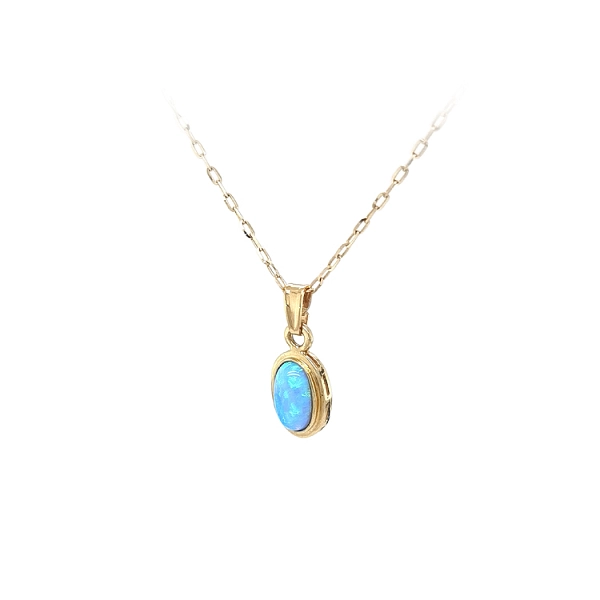 Gold-Anhänger mit blauem Stein