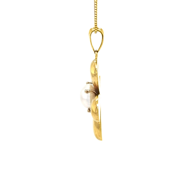Goldenes Kreuz mit Perle