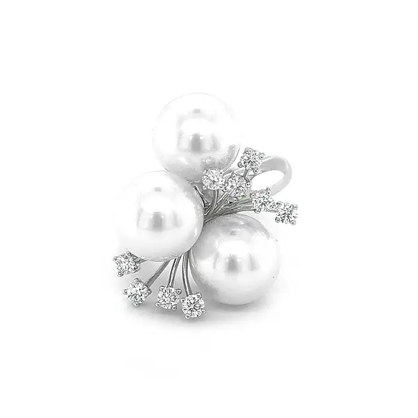 Goldring mit Perlen und Diamanten