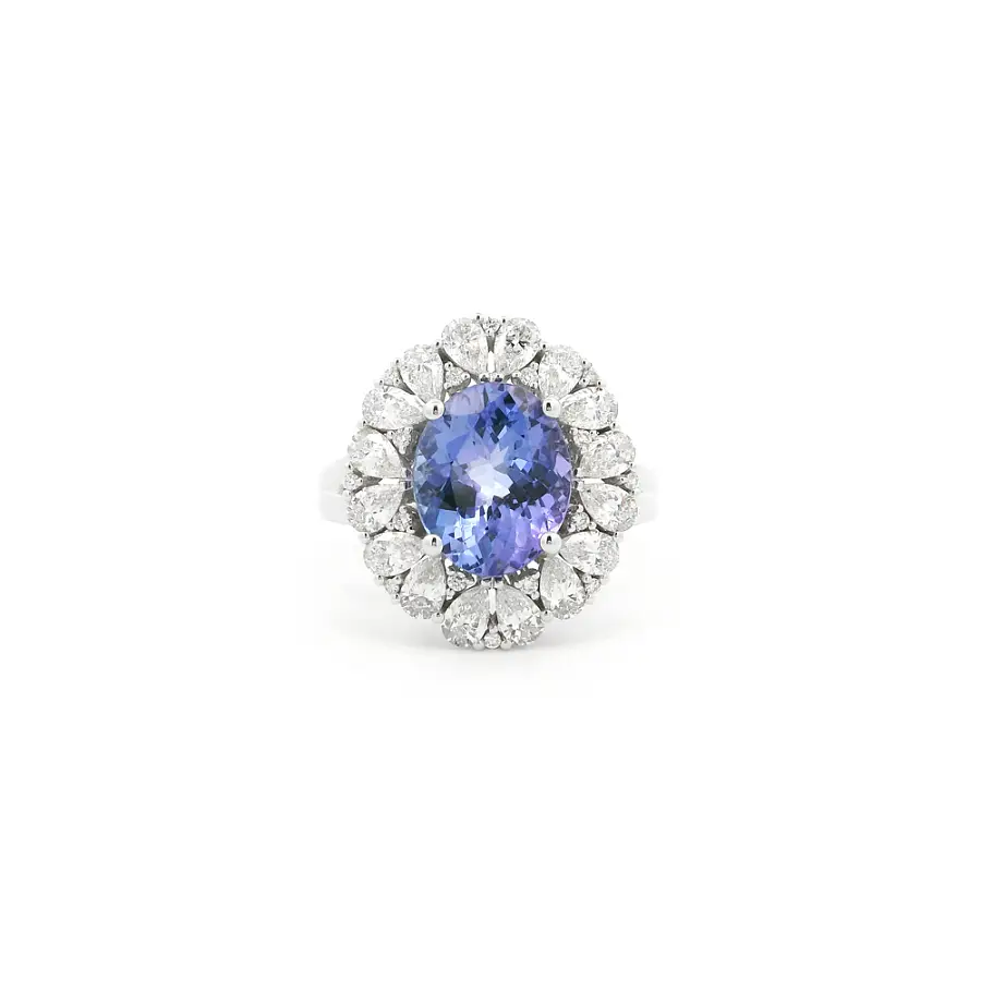 Weißgoldring mit Tansanit und Diamantkranz