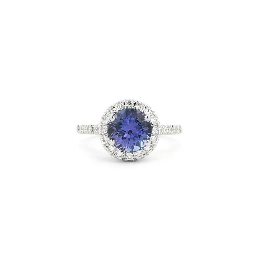 Weißgoldring mit Tansanit und Diamantkranz