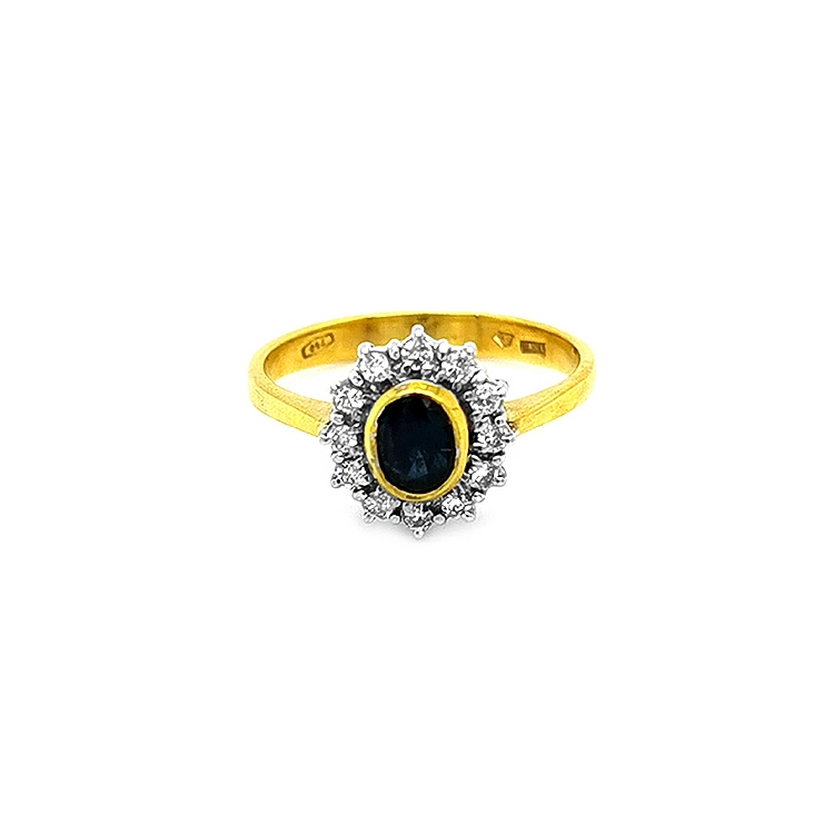 Goldring mit Saphir und Diamanten