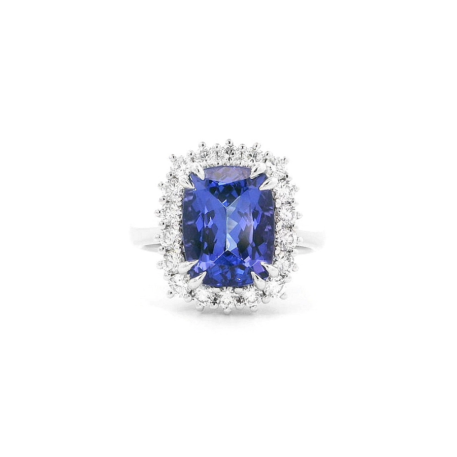 Luxusring mit Tansanit, umgeben von Diamanten in Weißgold