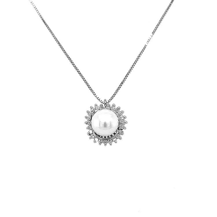 Goldanhänger mit Naturperle und Diamanten