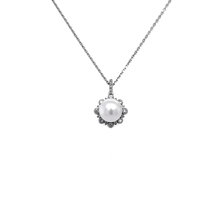 Gold-Anhänger mit Naturperle und Diamanten