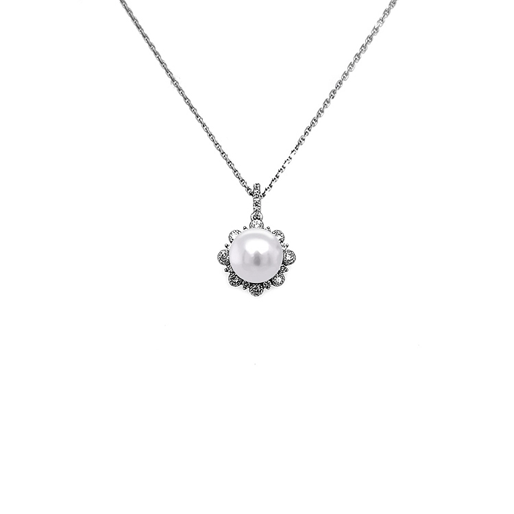 Gold-Anhänger mit Naturperle und Diamanten