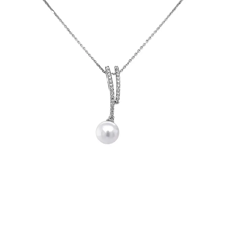 Goldanhänger mit Naturperle und Diamanten