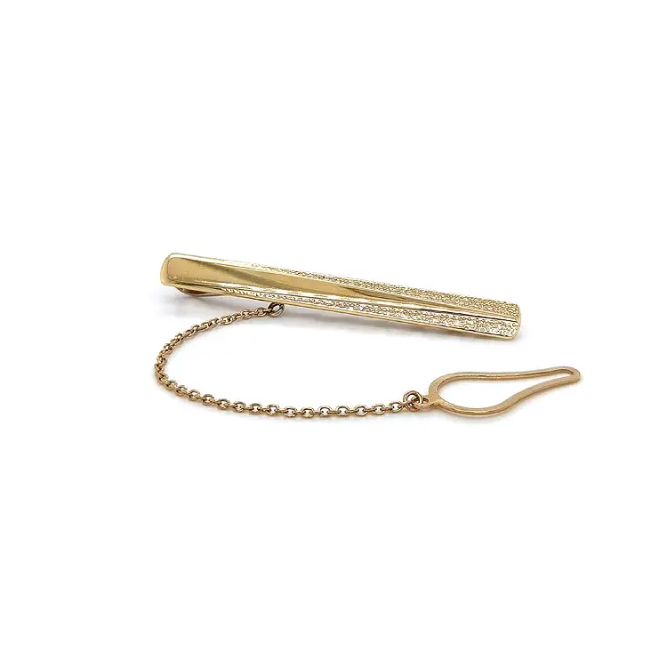 Goldene Krawattenschnalle