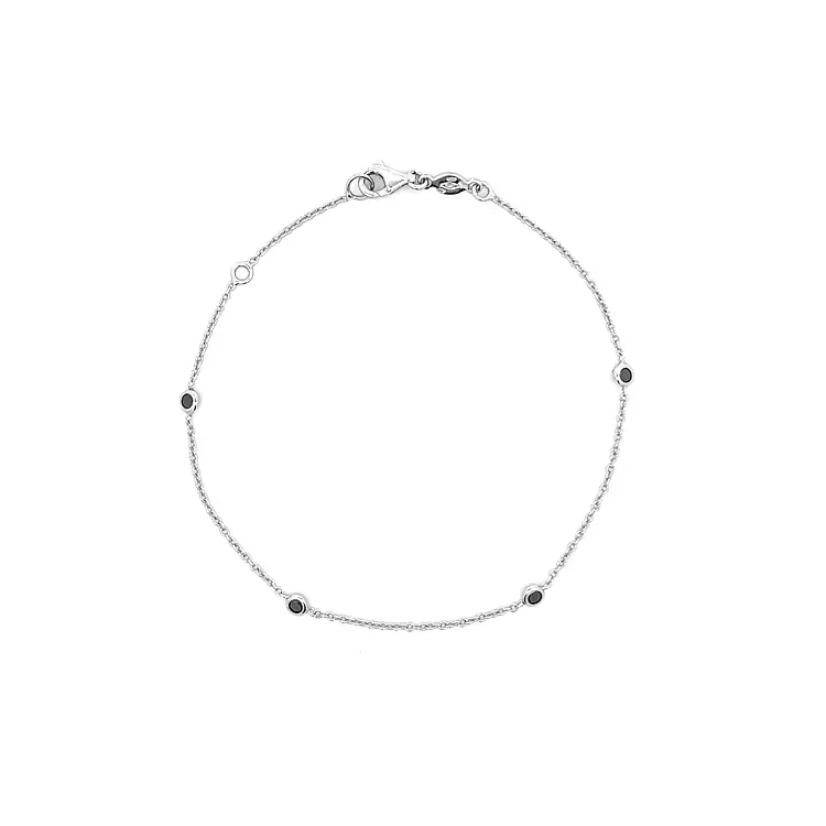 Goldarmband mit schwarzen Steinen