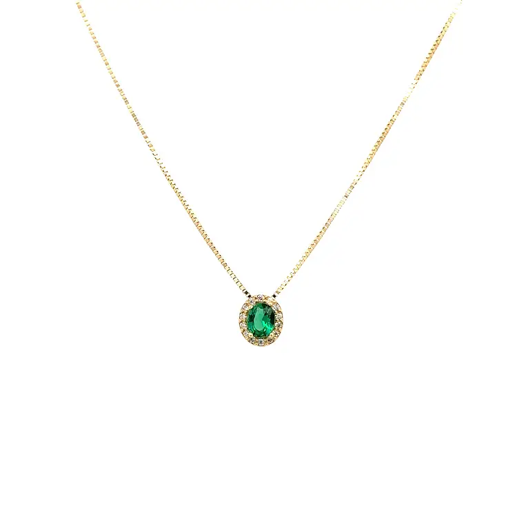 Goldene Halskette mit grünem Stein
