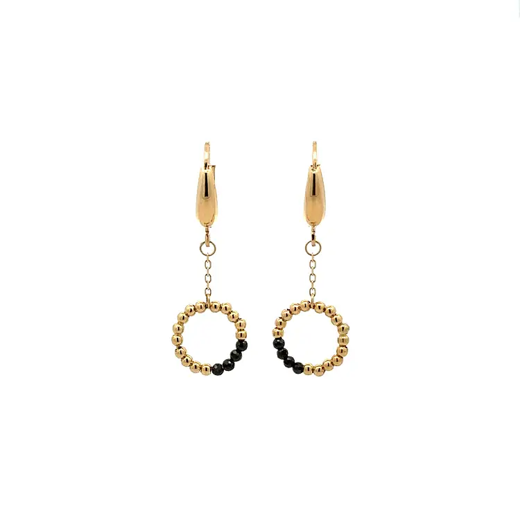 Goldene Ohrringe mit schwarzen Steinen