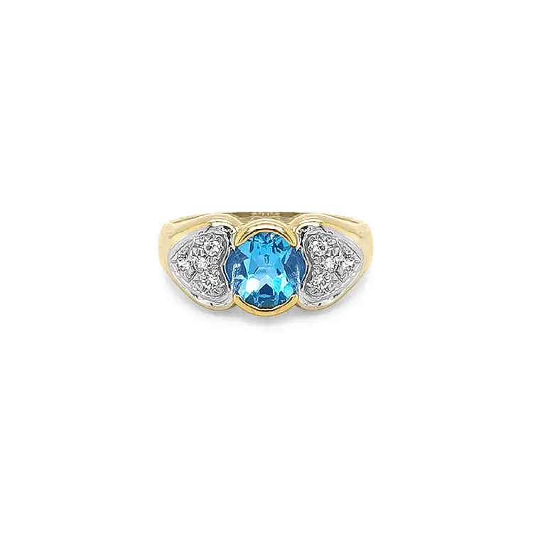 Exklusiver Goldring mit blauem Topas und Zirkonia