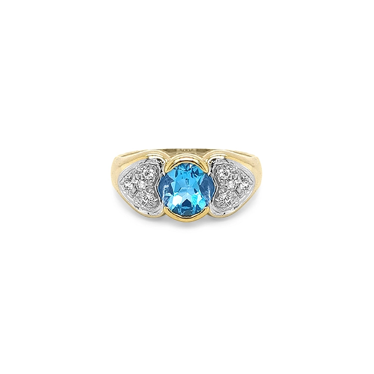 Exklusiver Goldring mit blauem Topas und Zirkonia