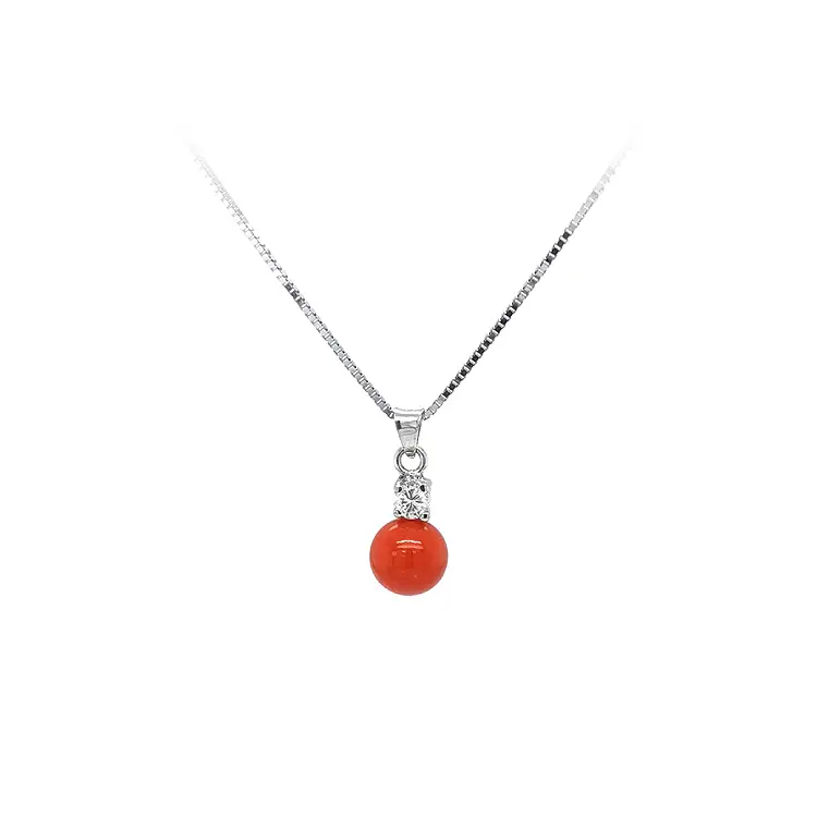 Anhänger mit Koralle aus Weißgold